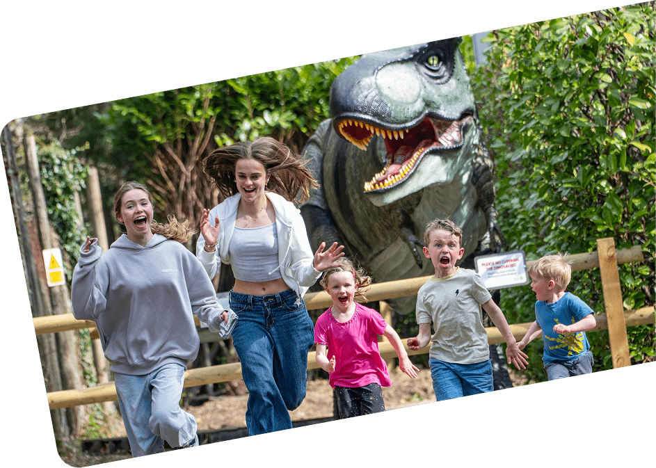 kids running from dinosaurs